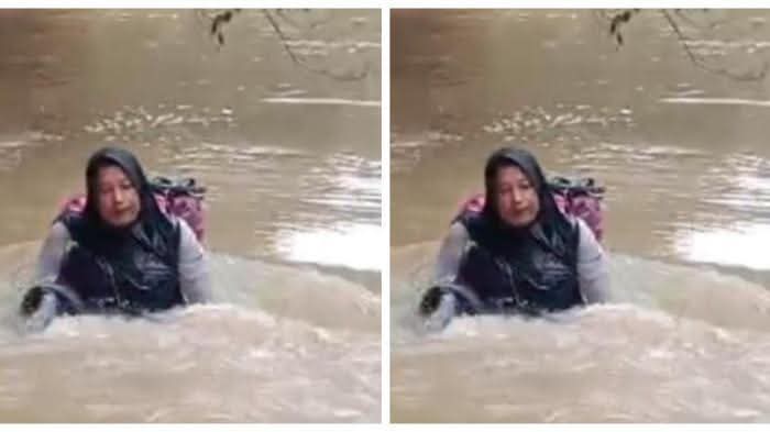 Ditunggu pasiennya, Bidan di Pasaman Nekat Renangi Sungai yang Deras
